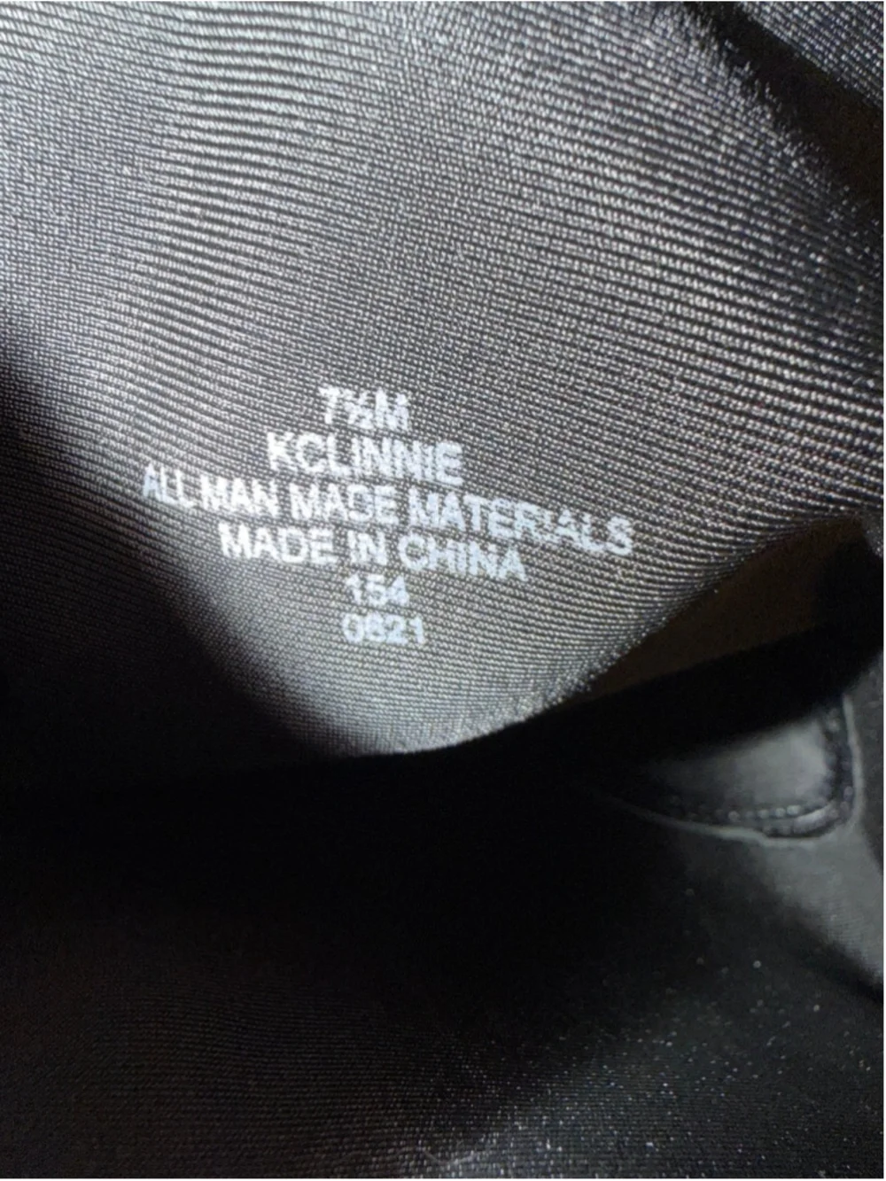 Calvin Klein black chunky platform boots featuring a thick, ridged lug sole.